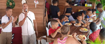Fundación Carlos Faña agasaja con almuerzo navideño a los niños del sector Buenos Aires de Nagua