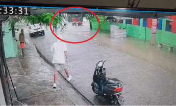 Dos niñas desaparecidas en San Cristóbal al ser arrastradas por aguas tras intentar cruzar alcantarilla al salir de escuela