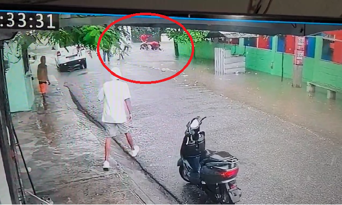 Dos niñas desaparecidas en San Cristóbal al ser arrastradas por aguas tras intentar cruzar alcantarilla al salir de escuela