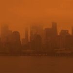 Humo de incendios forestales de Canadá arropa area triestatal; dominicanos alarmados en NYC